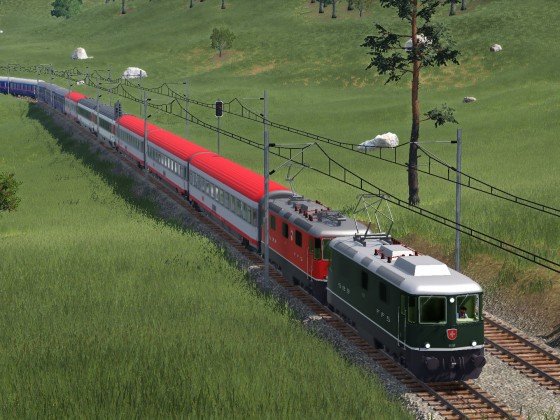Eine grüne und eine rote Re4/4 fuhren mit dem Nighttrain auf ihre Linie.