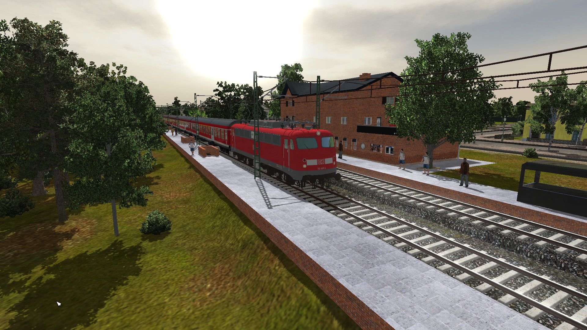 Br 110 mit Mittelstädter Waggons in Rot mit Wittenberger Kopf.