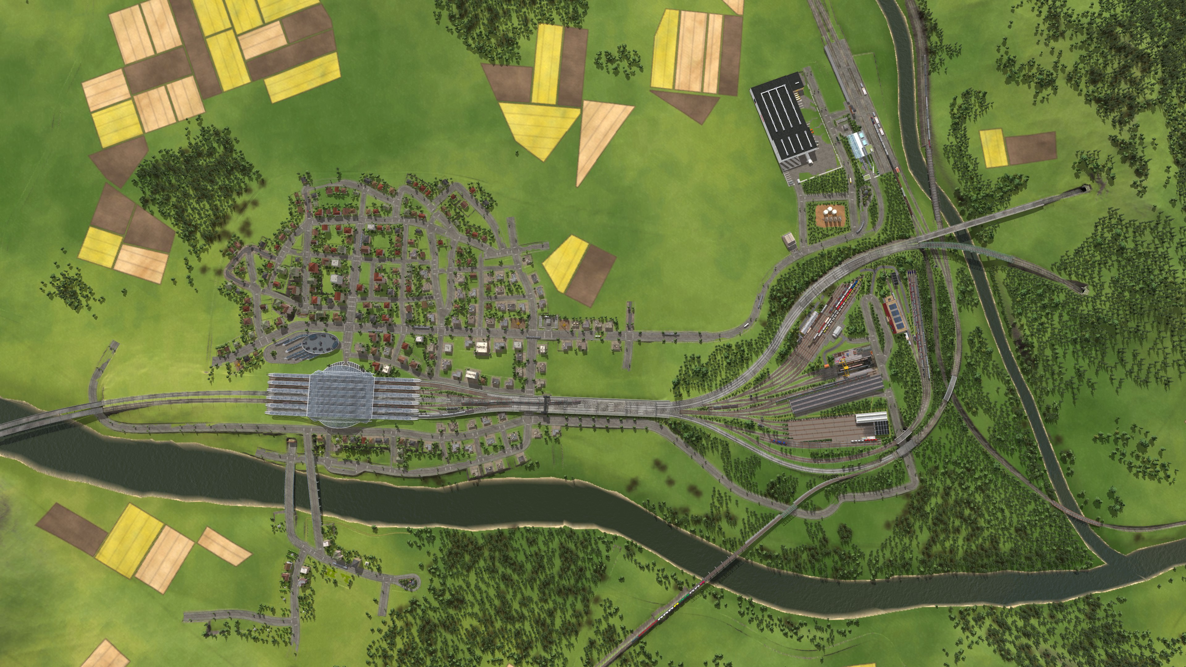 Eine Luftaufnahme der Stadt inkl. Hauptbahnhof und Betriebswerk