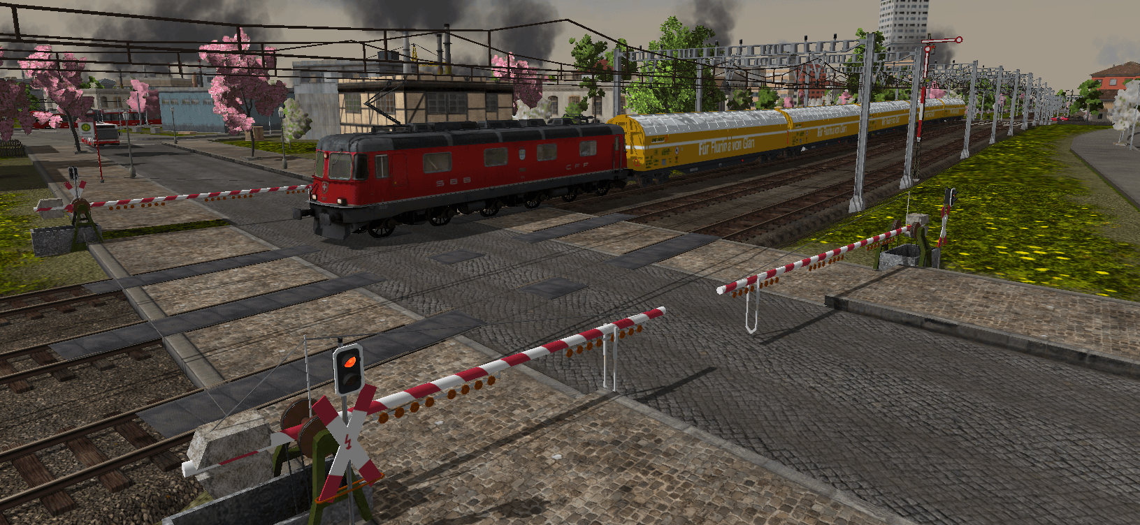 Re 6/6 überquert den Bahnübergang vor Basel