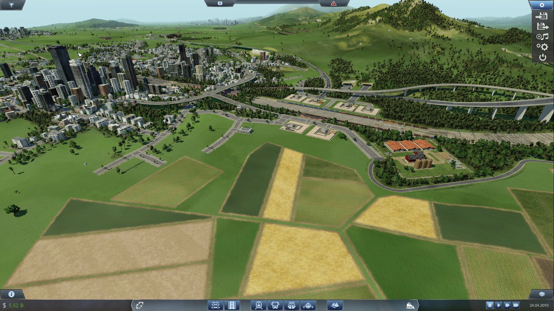 große Stadt mit Getreidefarm und großem Güterbahnhof im Wald