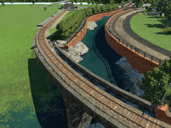 Flusslauf mit Mauer als Begrenzung, Eisenbahnbrücke und Radweg