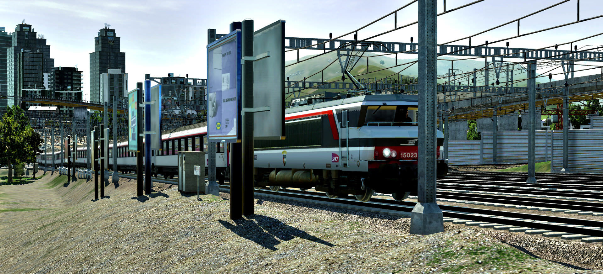 French BB 15023 with Corail carmillon left the train station