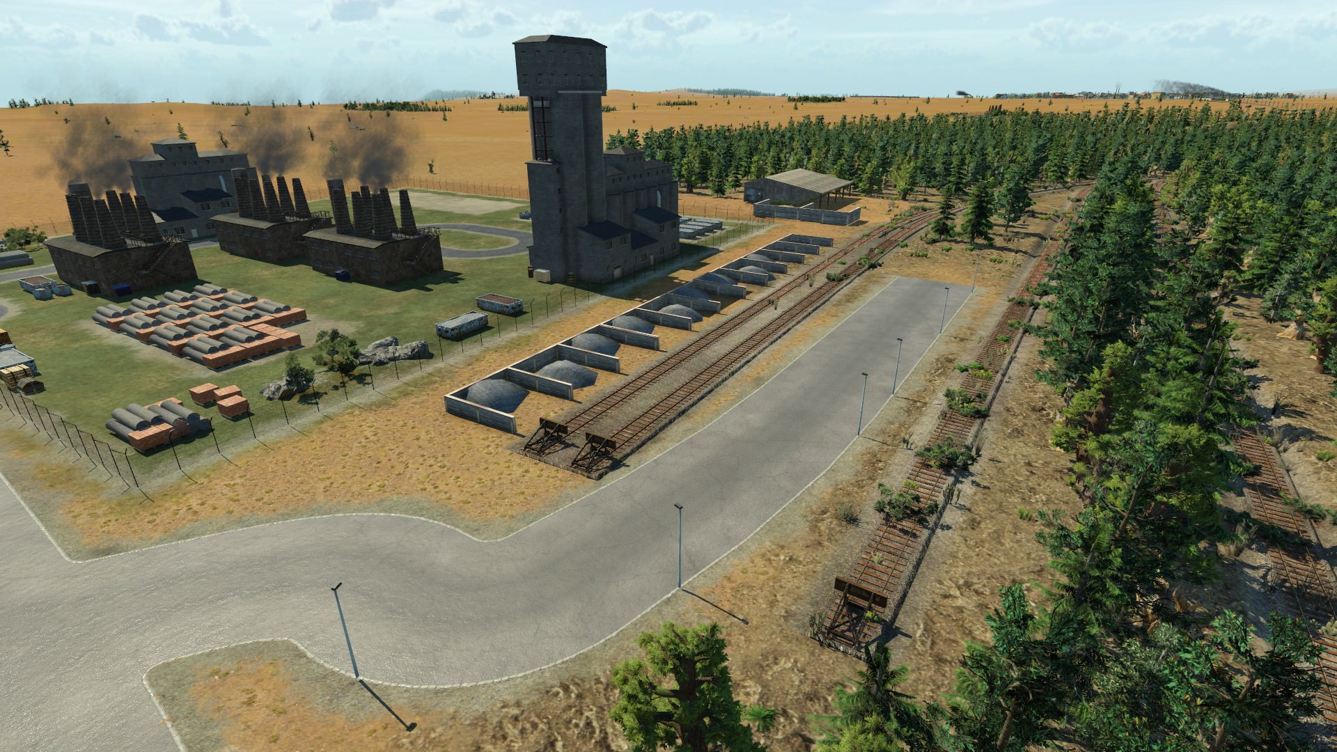 Baumaterialfabrik mit stillgelegten Gleisen