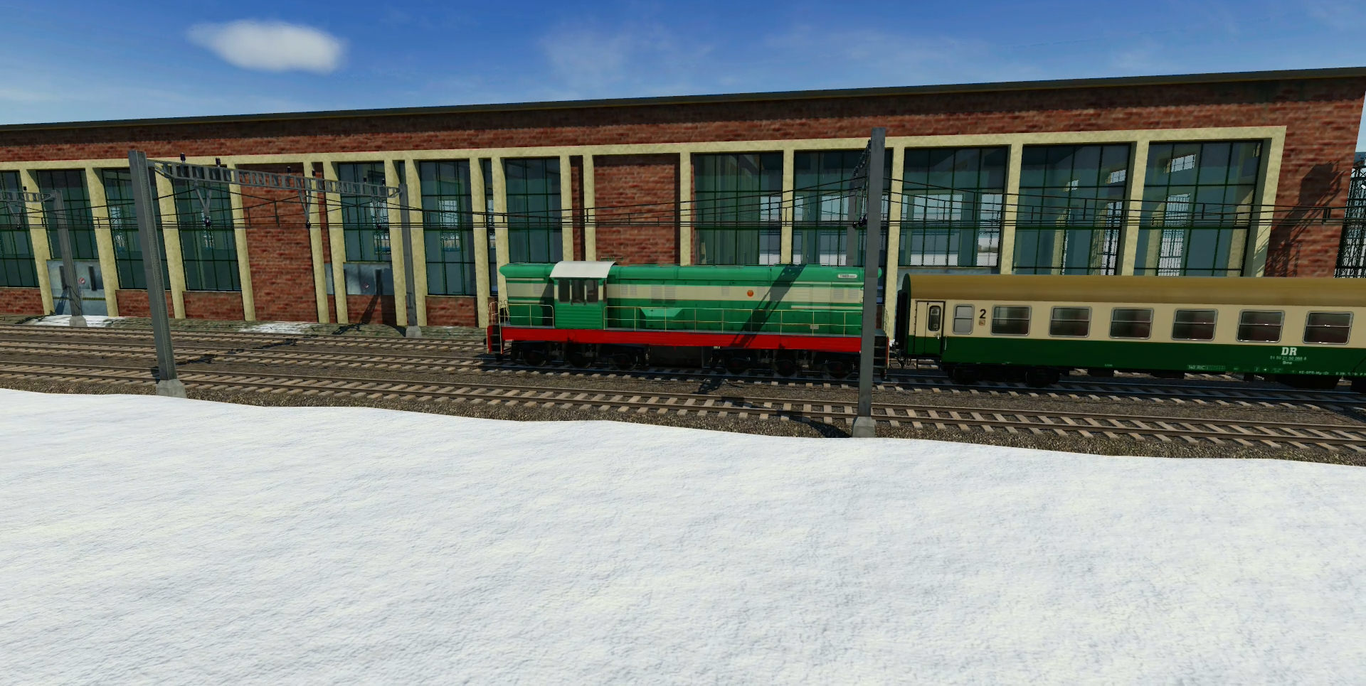 CKD T-669 verschiebt ein paar geliehene Reichsbahnwagen