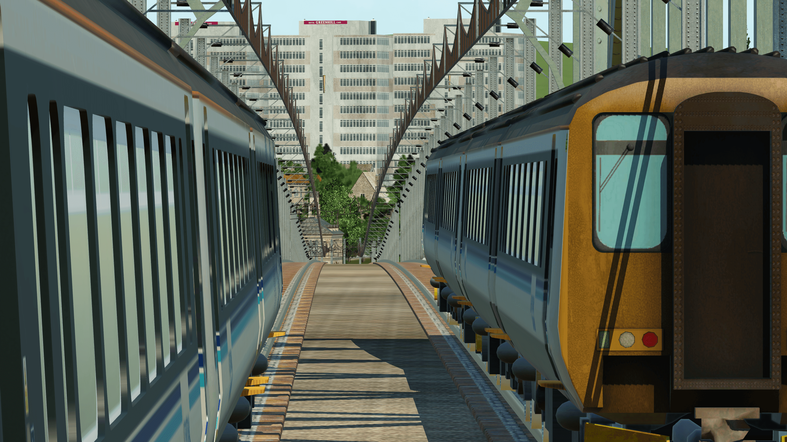 Two Class 156s (for Glossop - Left and for Piccadilly -Right) pass over the M6 outside Manchester