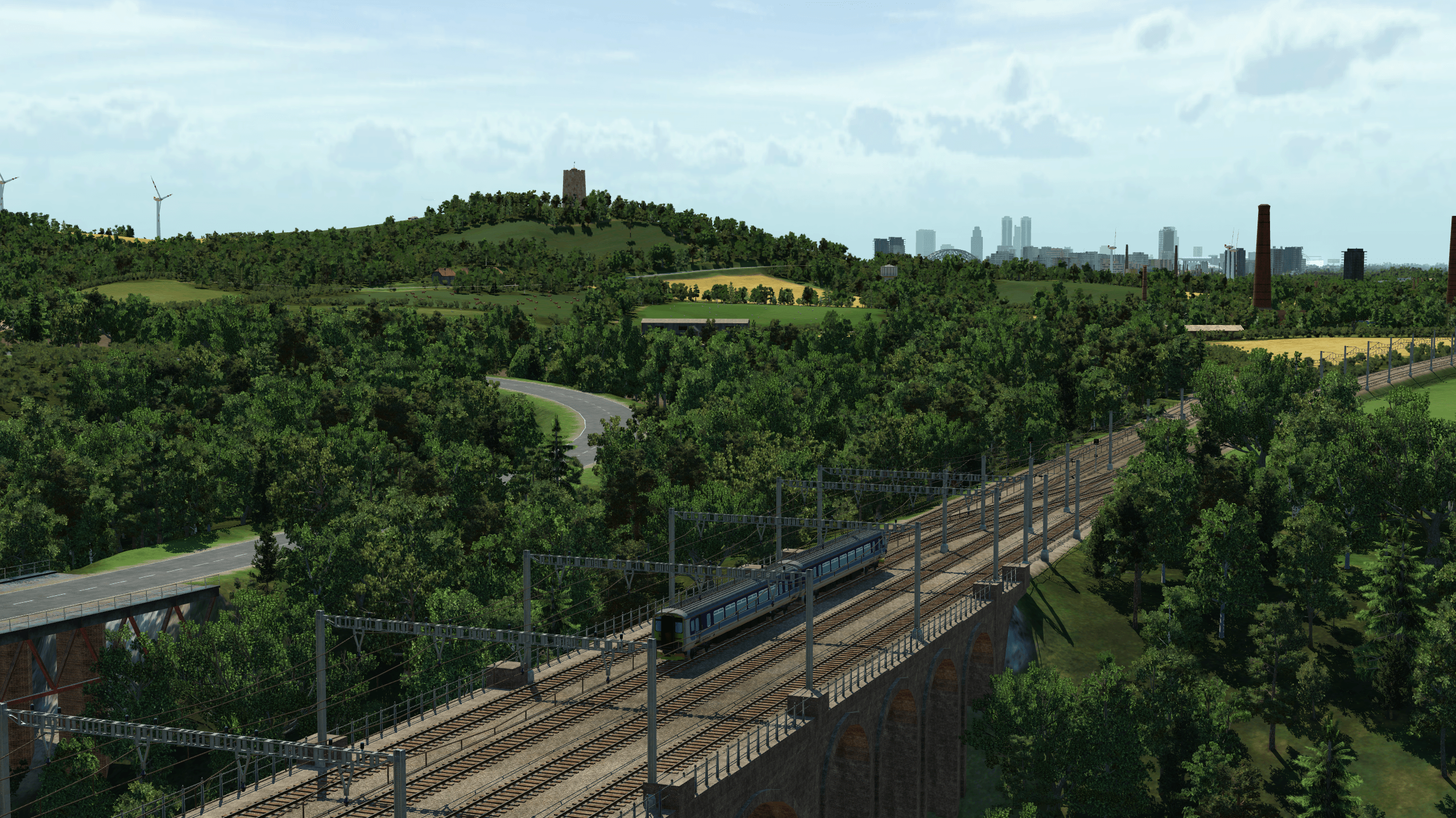 A lonely class 156 crosses Bradford Viaduct