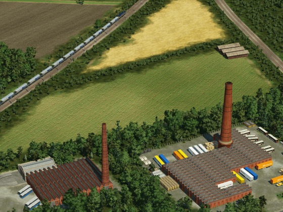 Two mills and the two converging Manchester-Leeds/Bradford lines with a Biomass train.
