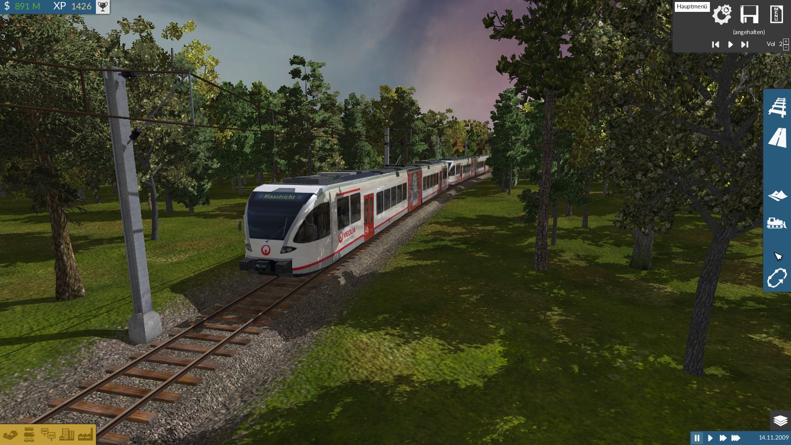 Nebenbahn unterwegs durch den Wald mit Beiwagen