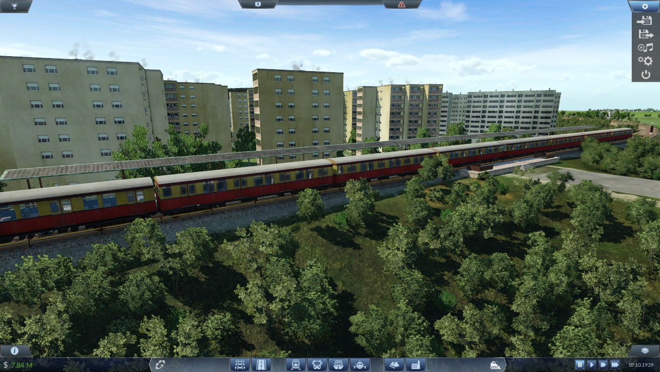 Blick über den Bahndamm auf den bereits ferigen teil der Siedlung