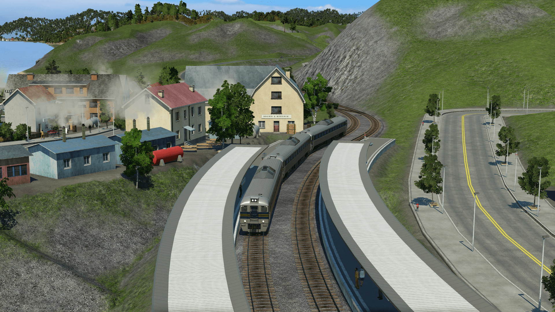 Im Küstenort Tsuna fährt eine Dreiereinheit B&O RDC-Triebwagen ein