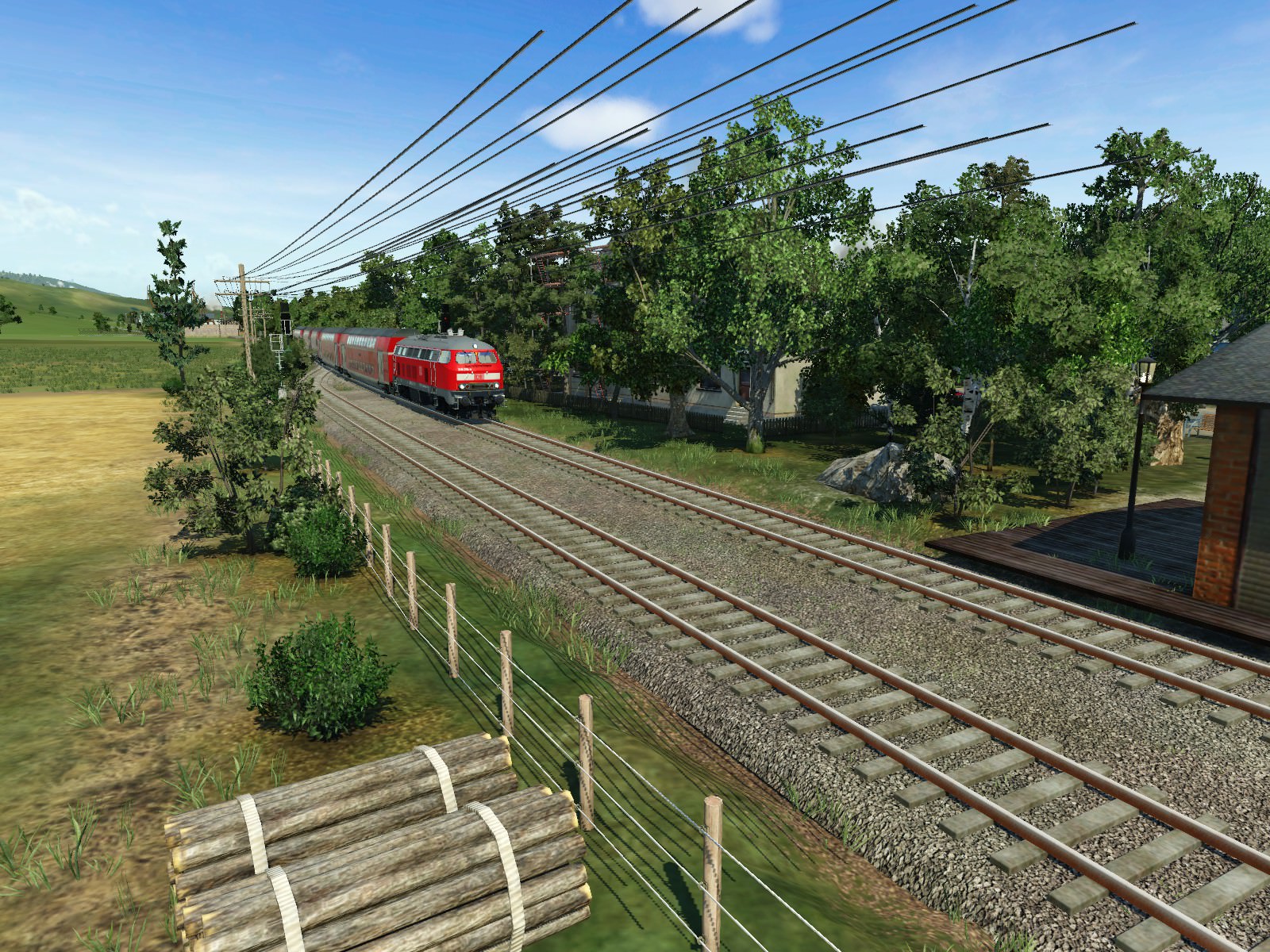 Die 218 330 zieht den RE21477 nach Langenheim.