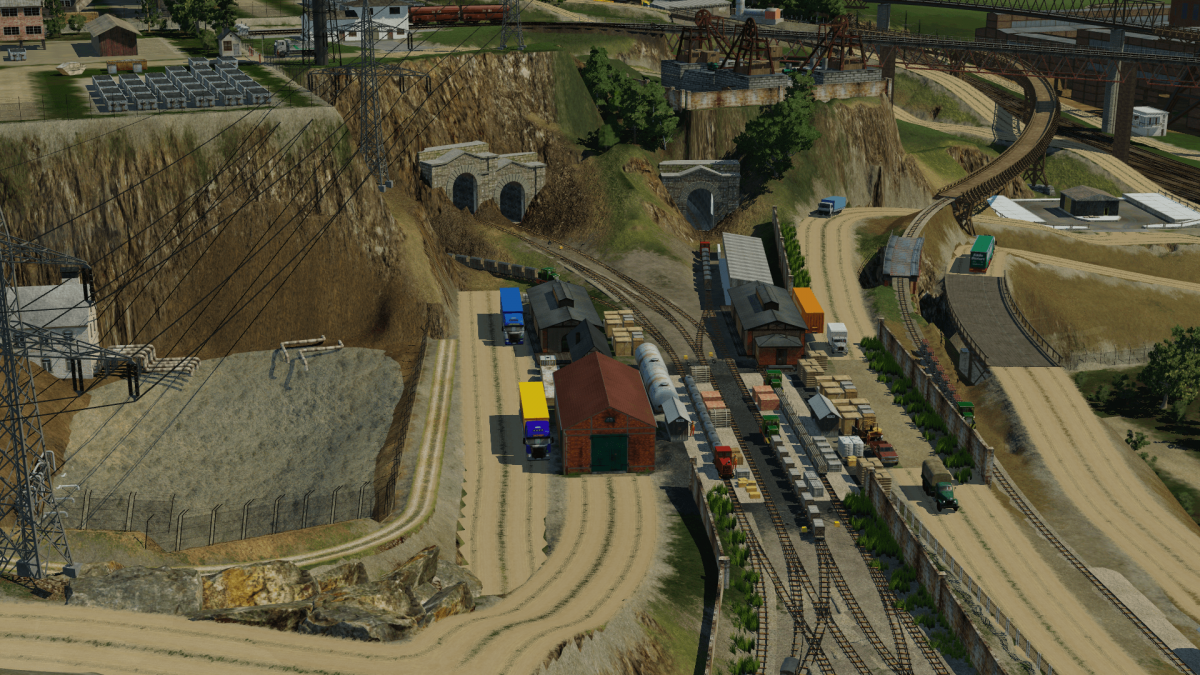 Der Umschlagplatz der Grubenbahn für die Versorgung der Minen ist auch in betrieb - links zu sehen ist auch die Pumpstation fürs Ab- und Sickerwasser der oberen Minen.