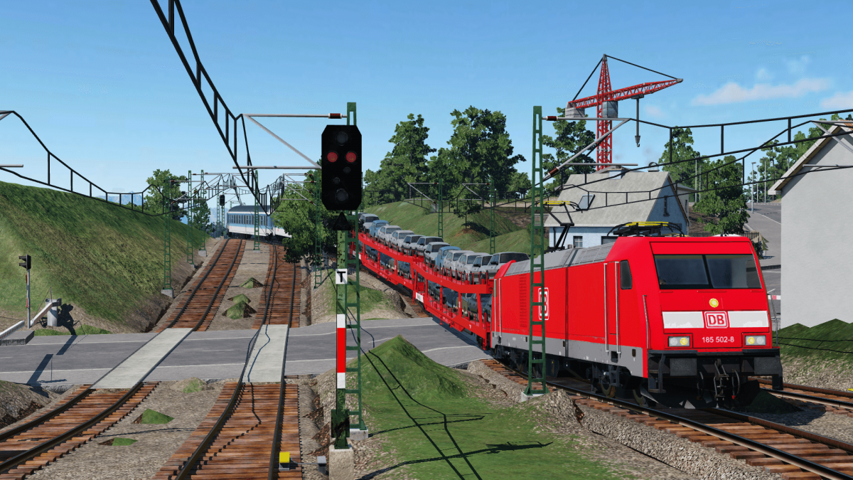 Hohenland Bahnübergang mit Touristenexpress