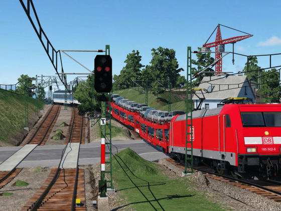 Hohenland Bahnübergang mit Touristenexpress