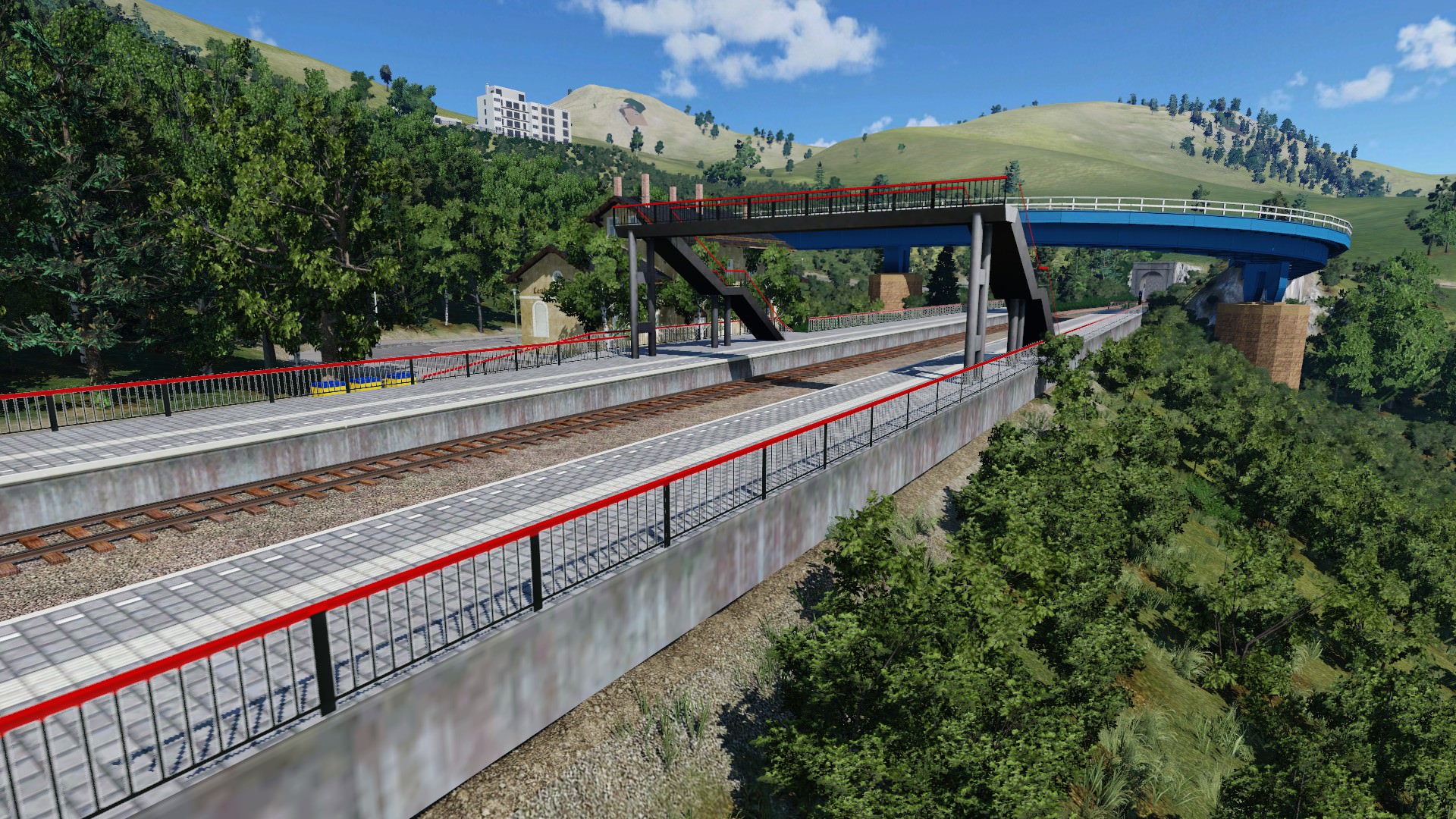 Ortsbahnhof mit Bergblick