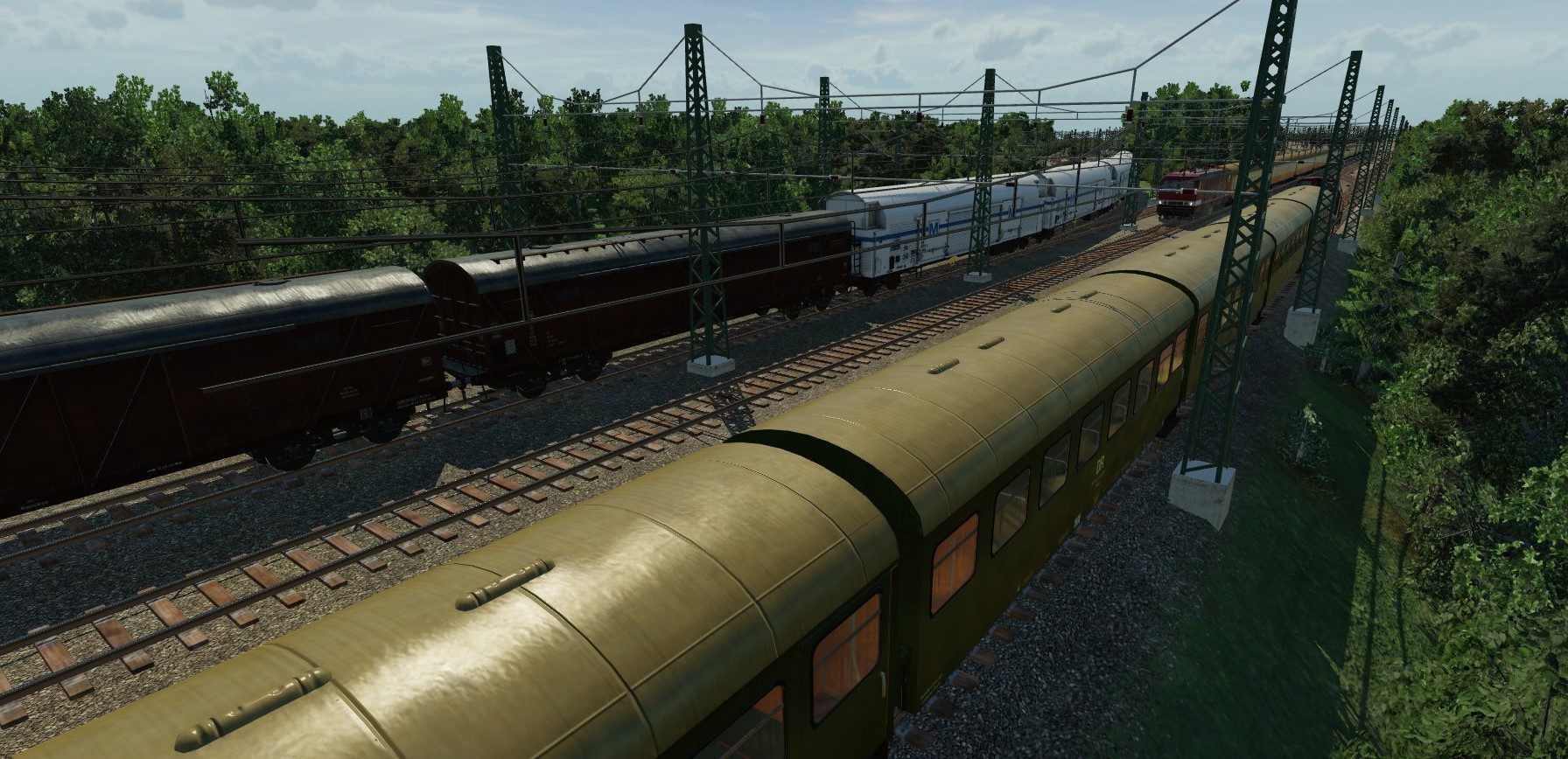 Zugbegegnung eines TEEM Güterzuges, einem EX 141 Börde und P 3856 an der Einfahrt Rangierbahnhof Seddin