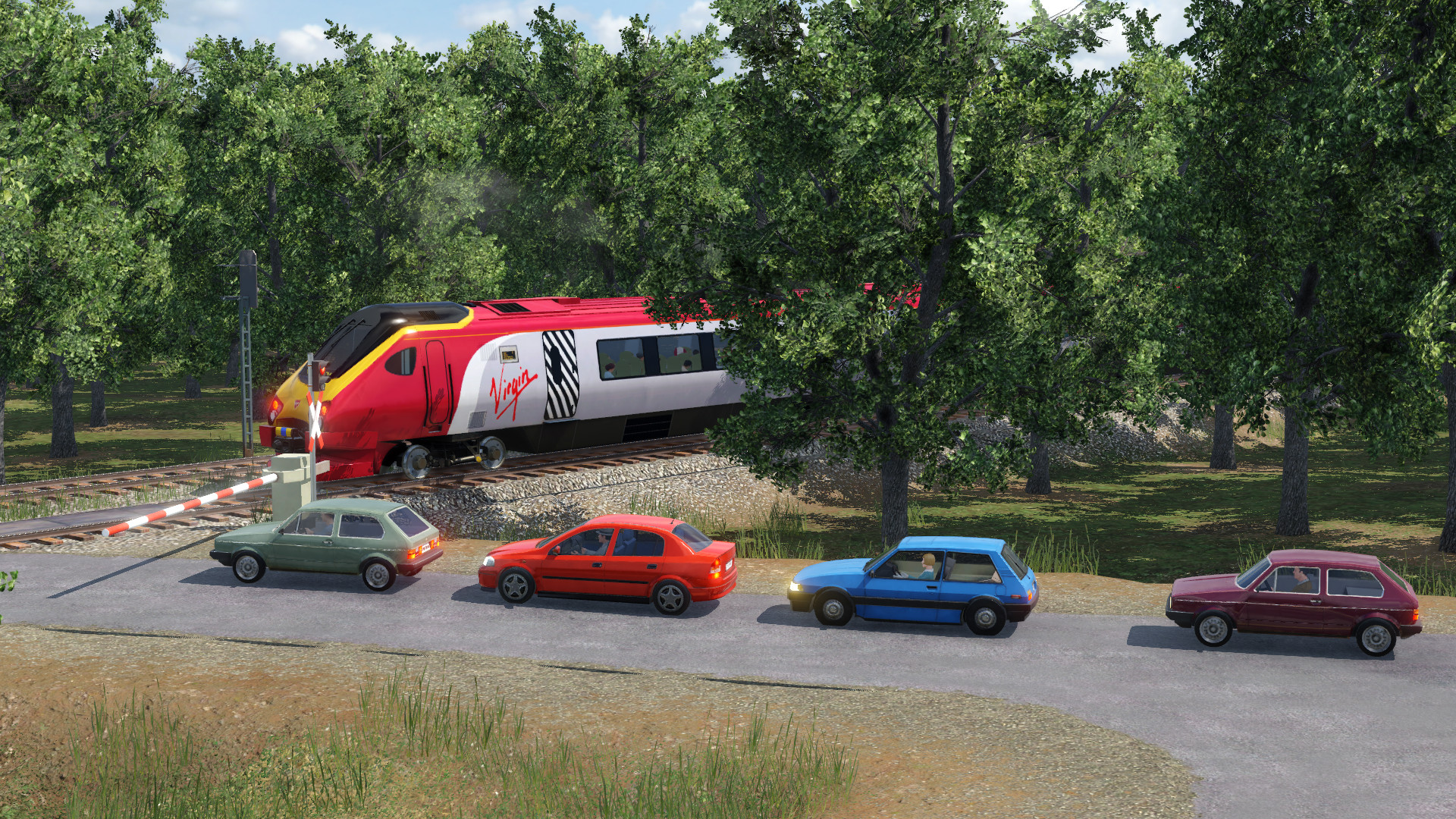 Class 220 by the crossing
