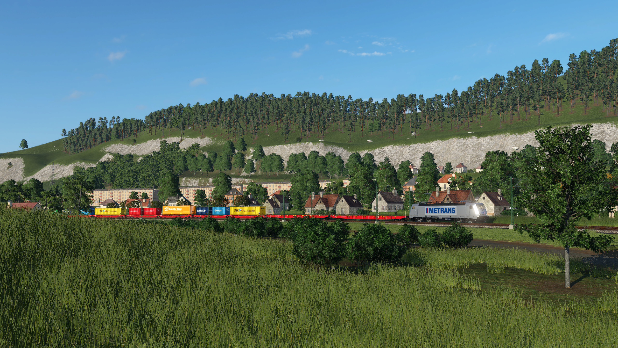 Metrans mit einem Containerzug nach Norden - Schönbau