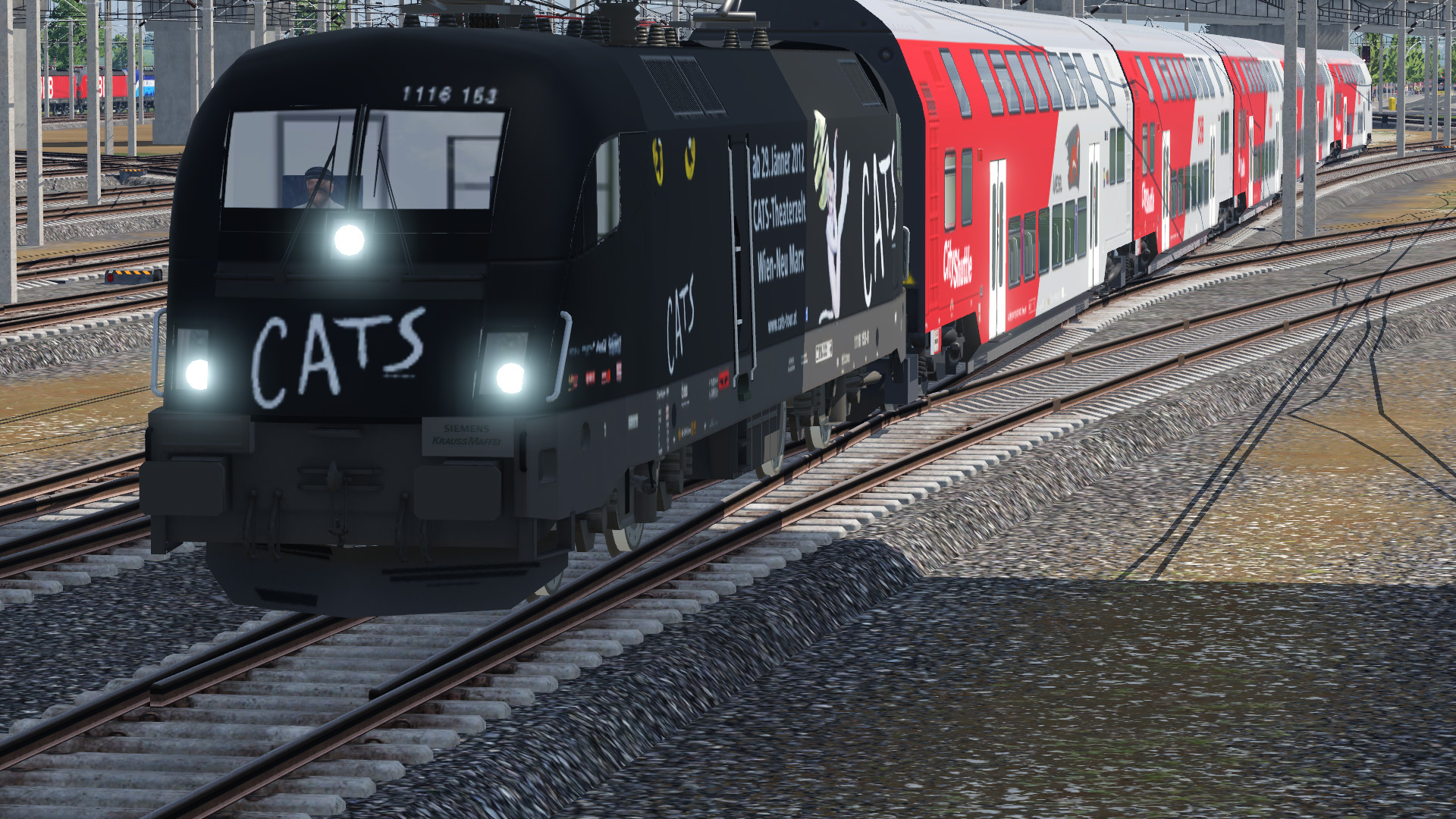 REX mit Cats-Lok bei der Einfahrt in den HBF