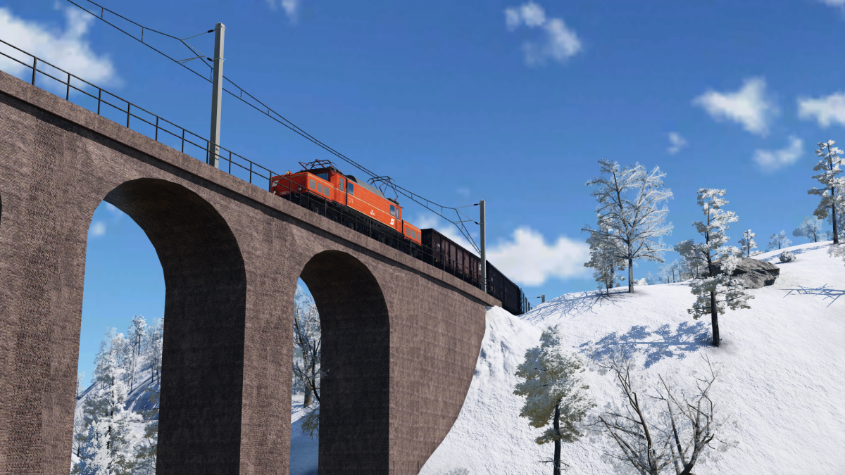 ÖBB 1020.10 mit Güterzug am Haken passiert das "Hochbruckenviadukt"