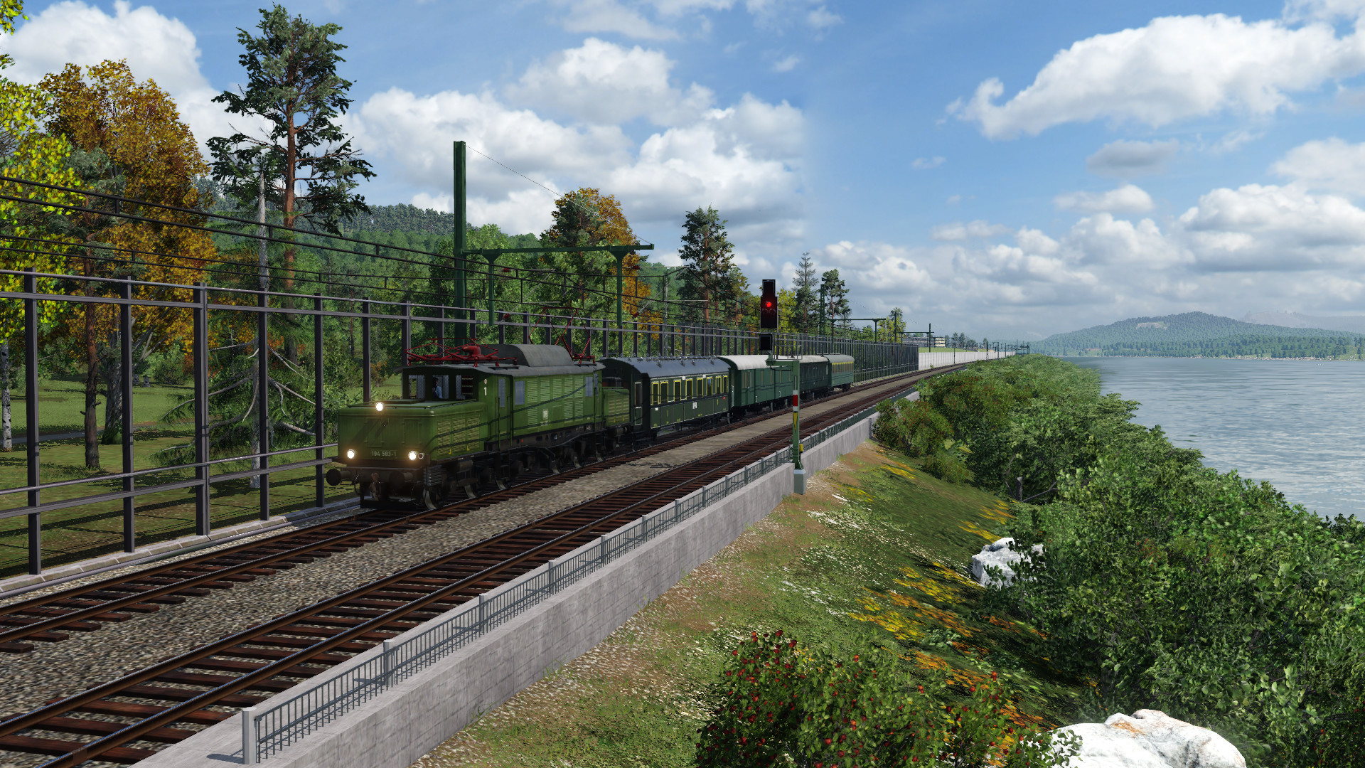 Mit der E94 und dem Lumpensammler entlang des Flussufers