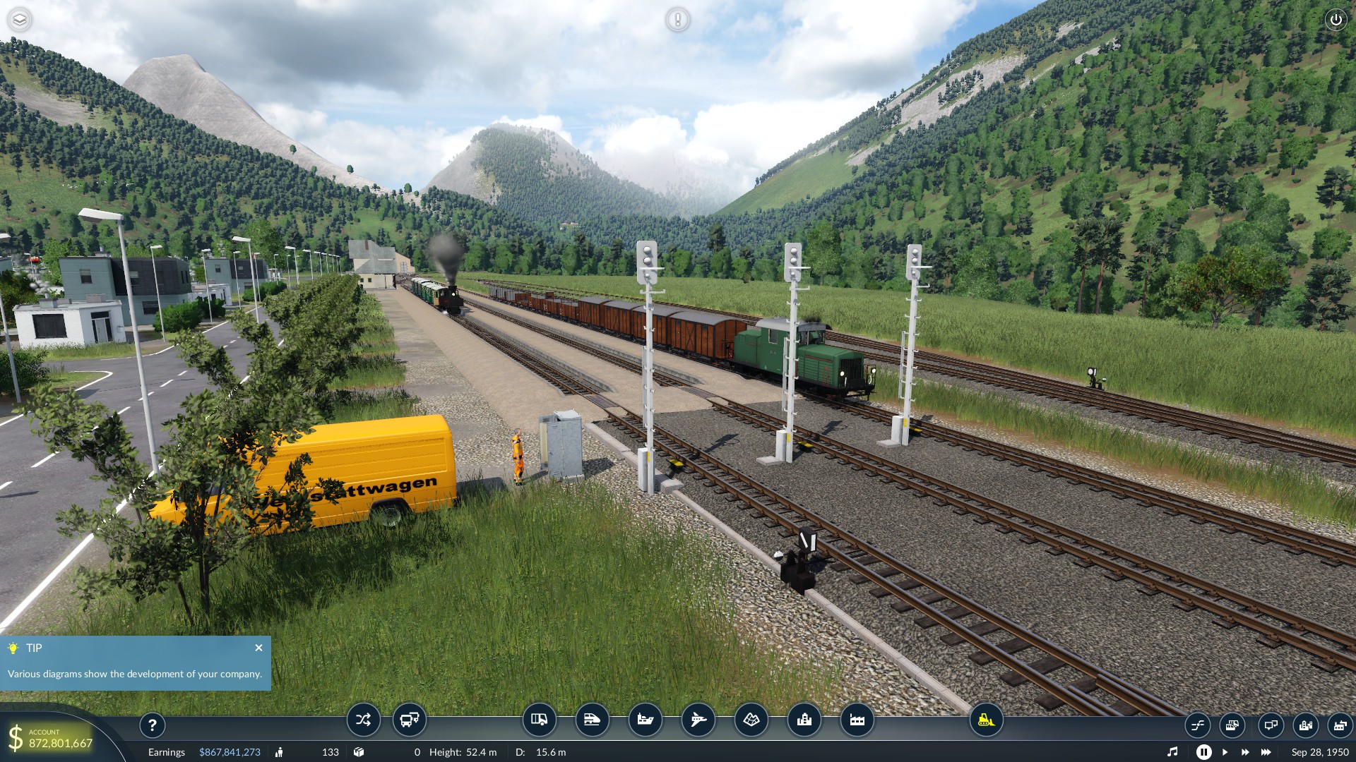 Signal Worker repairing an electrical fault as an empty freight train leaves town.
