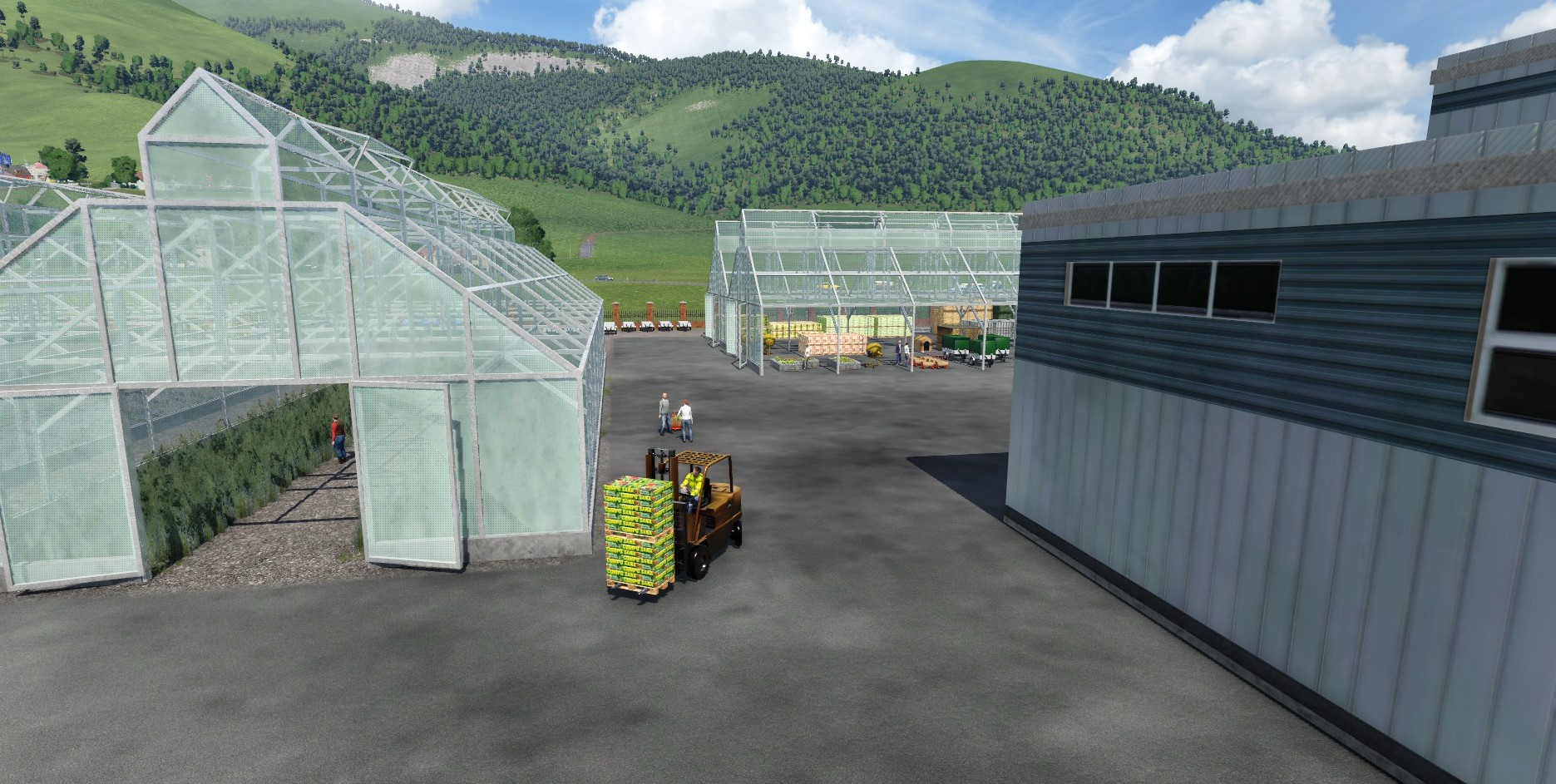 Tom is bringing two pallets of compost to the loading zone in preparation of an order being picked up later today.