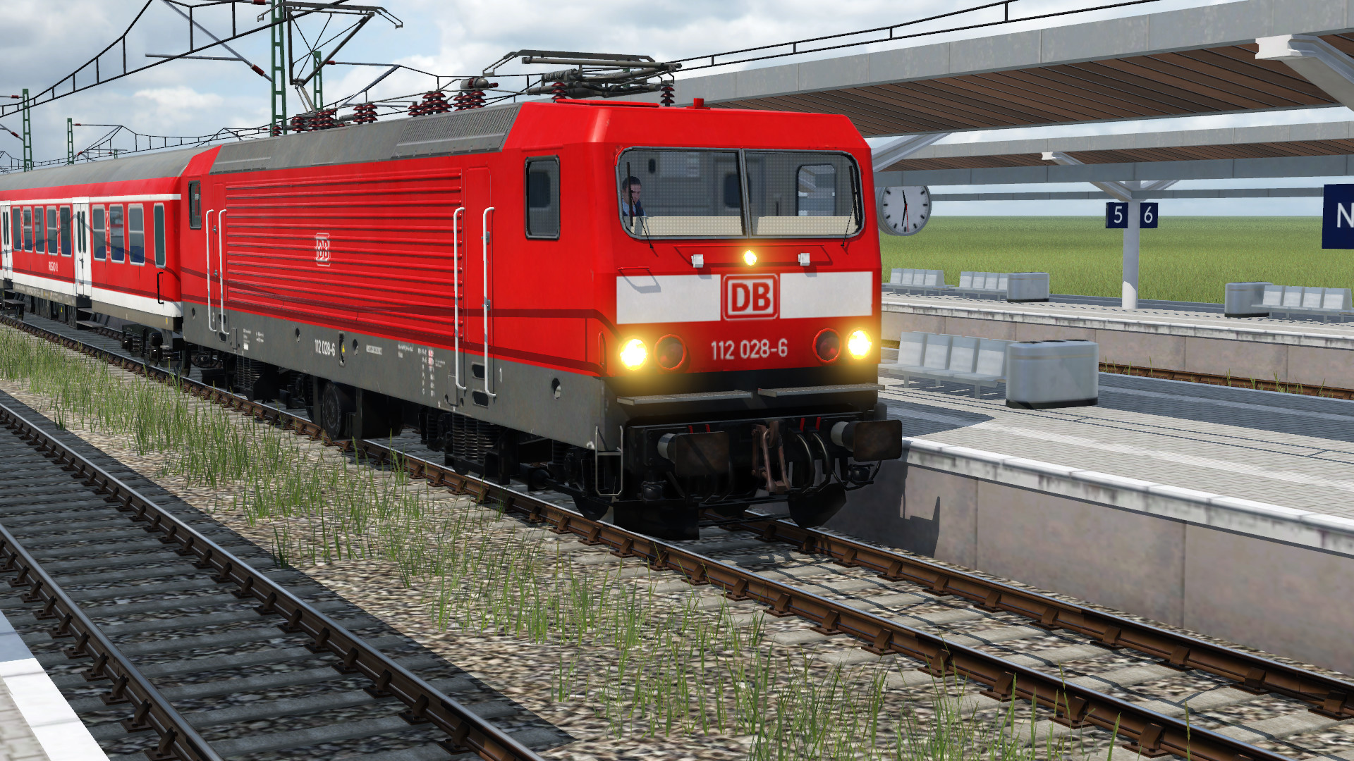 112-028-6 Als RB77 unterwegs nach Kiel Hbf