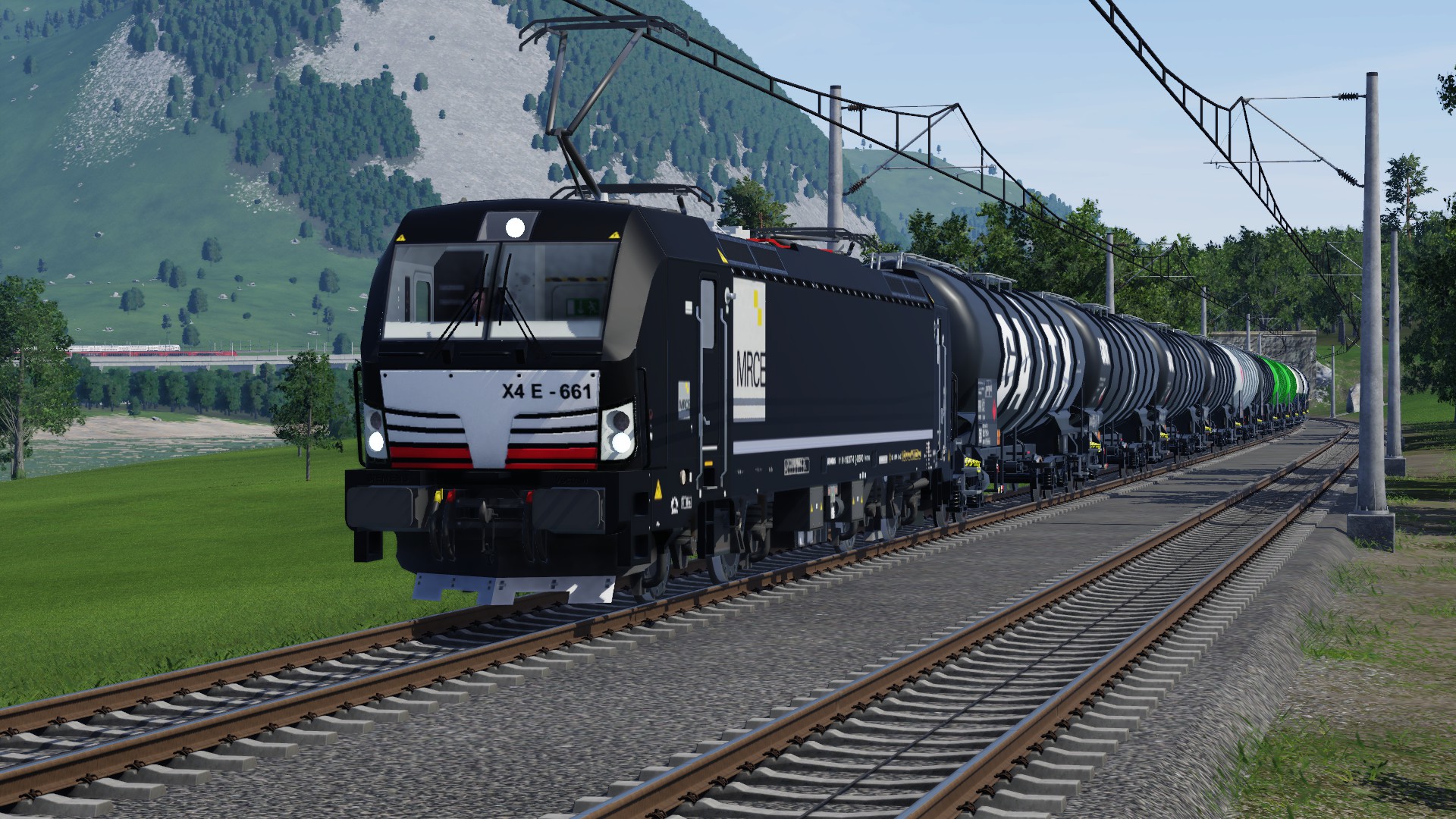 MRCE Vectron zieht Kessel GZ über die Güterstrecke, im hintergrund sind RJ 0815 "Toffel" und der IC 2068 zu sehen