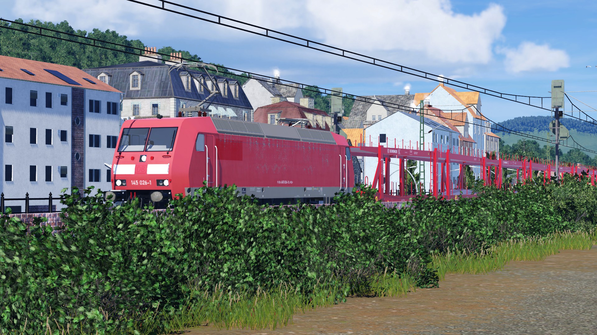 145 026 zieht den leeren Autozug Richtung Norden...