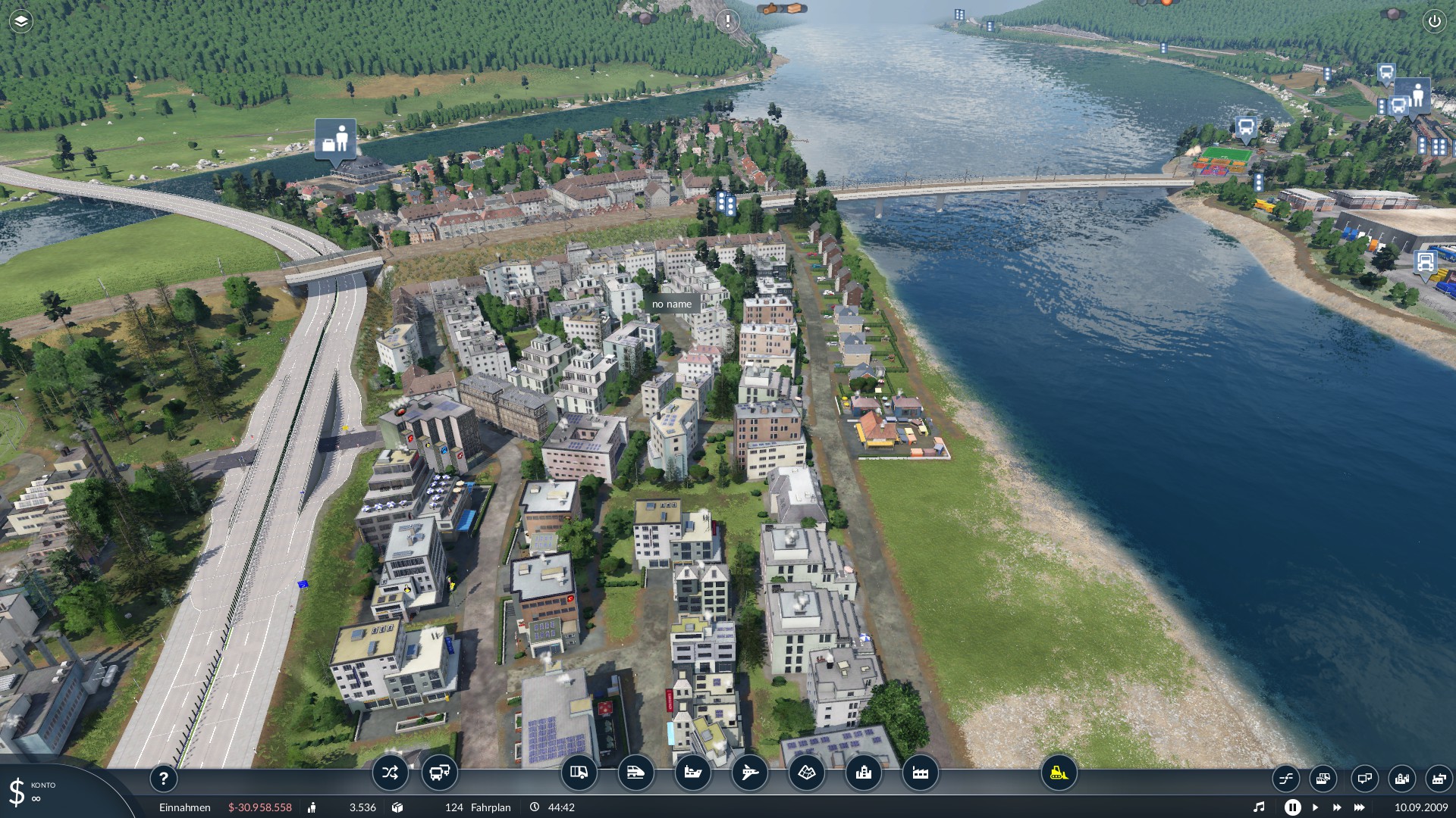 Etwas Strand mit klein Wohnungen in der gross Stadt und einem Hafen