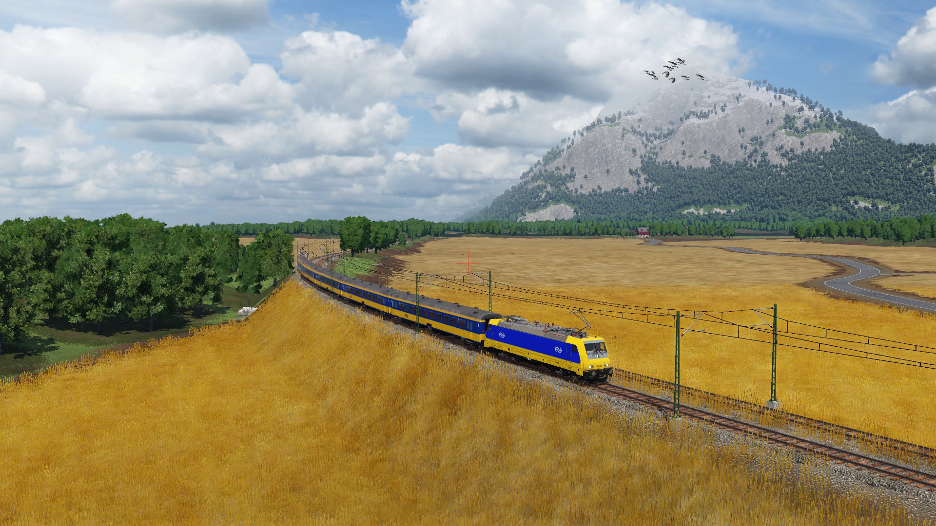 NS 186 mit IC 964 auf den Feldern vor Mooville.