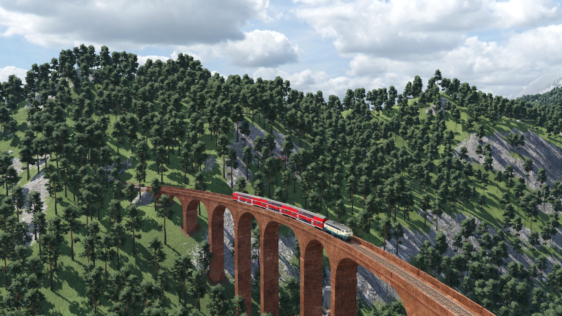 218 446 mit einer Regionalbahn kurz vor Tornau.