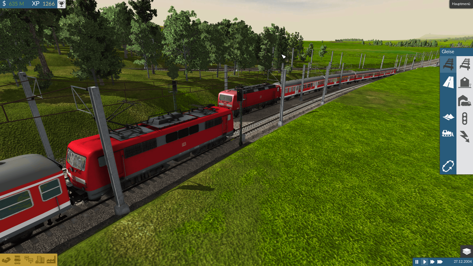 Eine Regionalbahn fährt in den 1-gleisigen Bahnhof ein