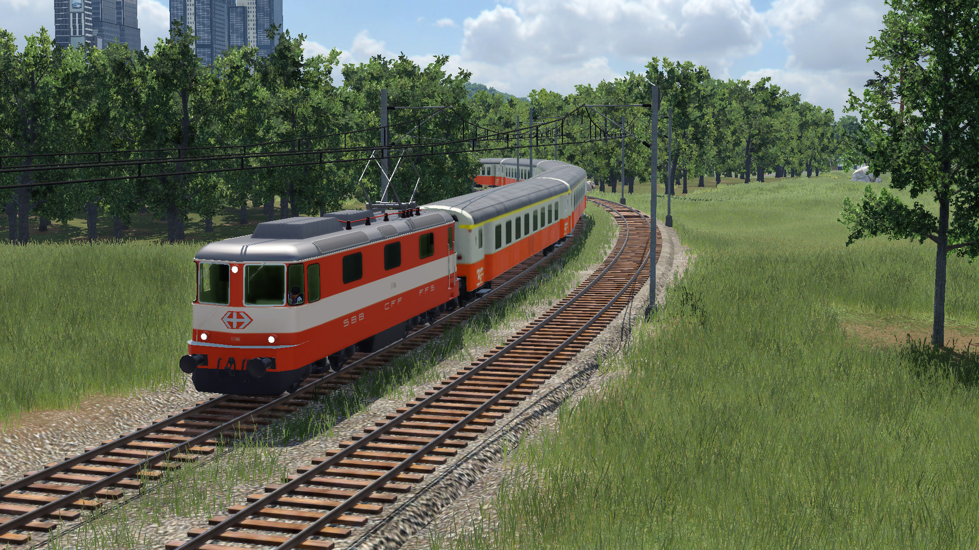 Re4/4 II11106 Swiss Express mit Swiss Express Wagen.