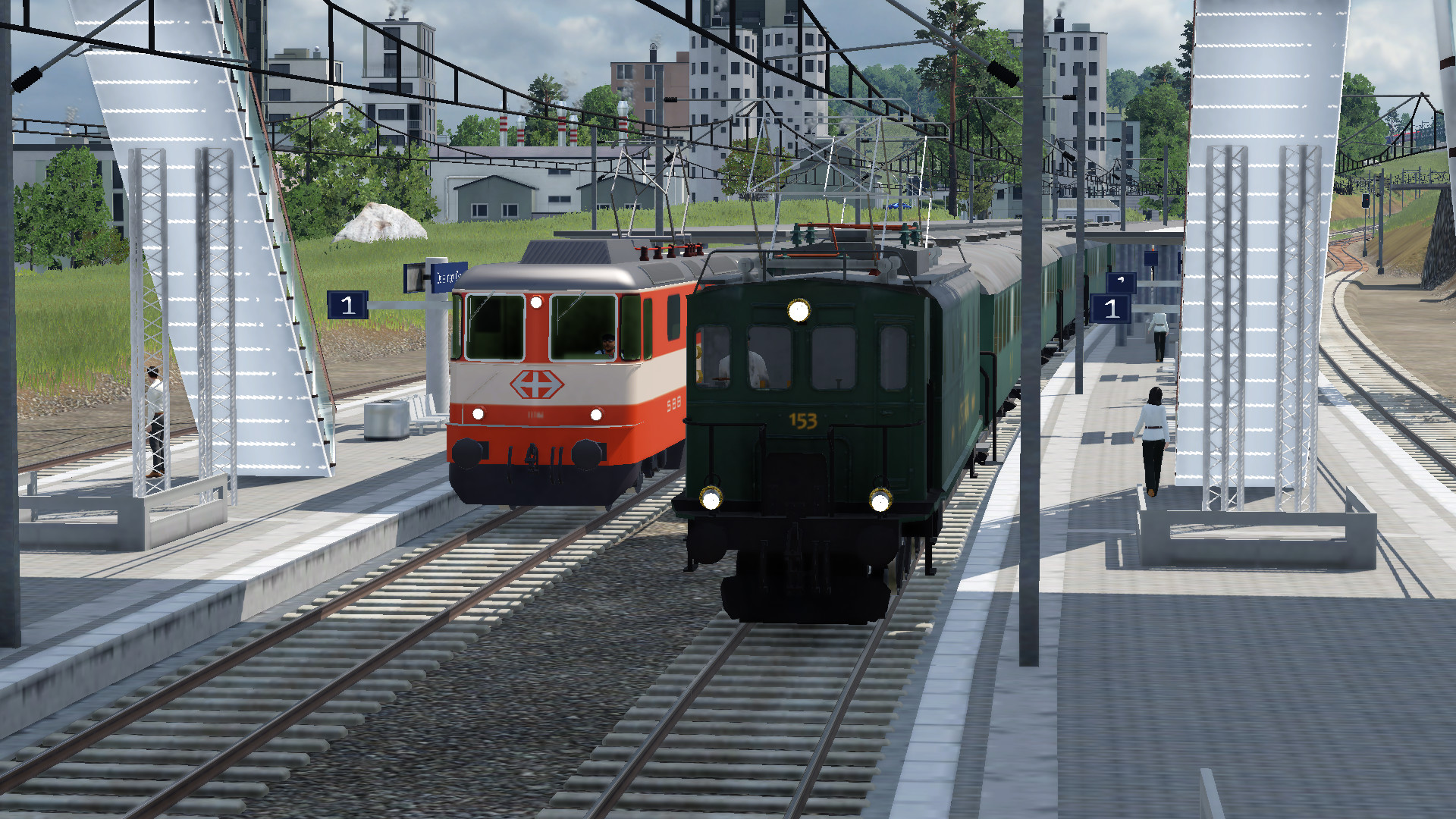 Parallel einfahrt von Be5/7 153 und Re4/4 II 11106