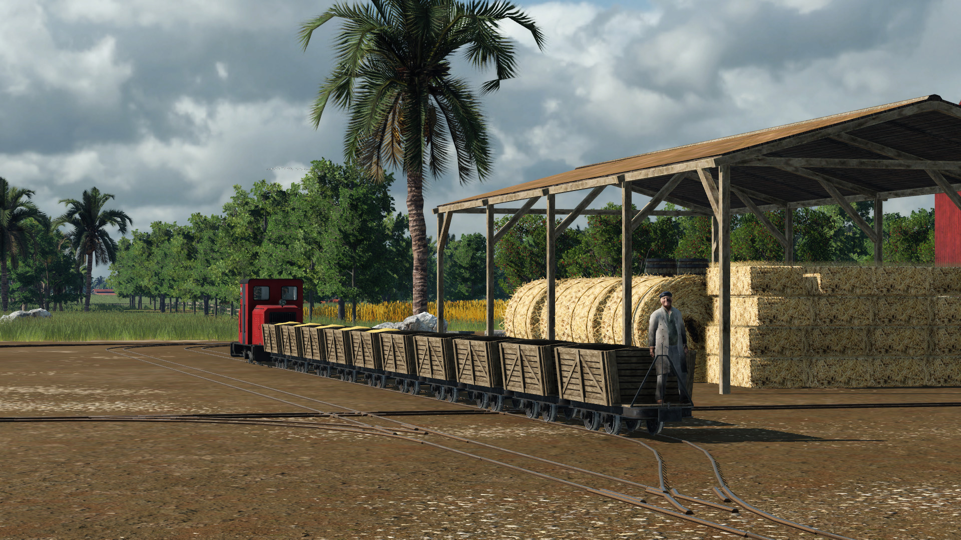 Feldbahn fährt auf Bauernhof und Industrieanlage "Lebensmittelfabrik"