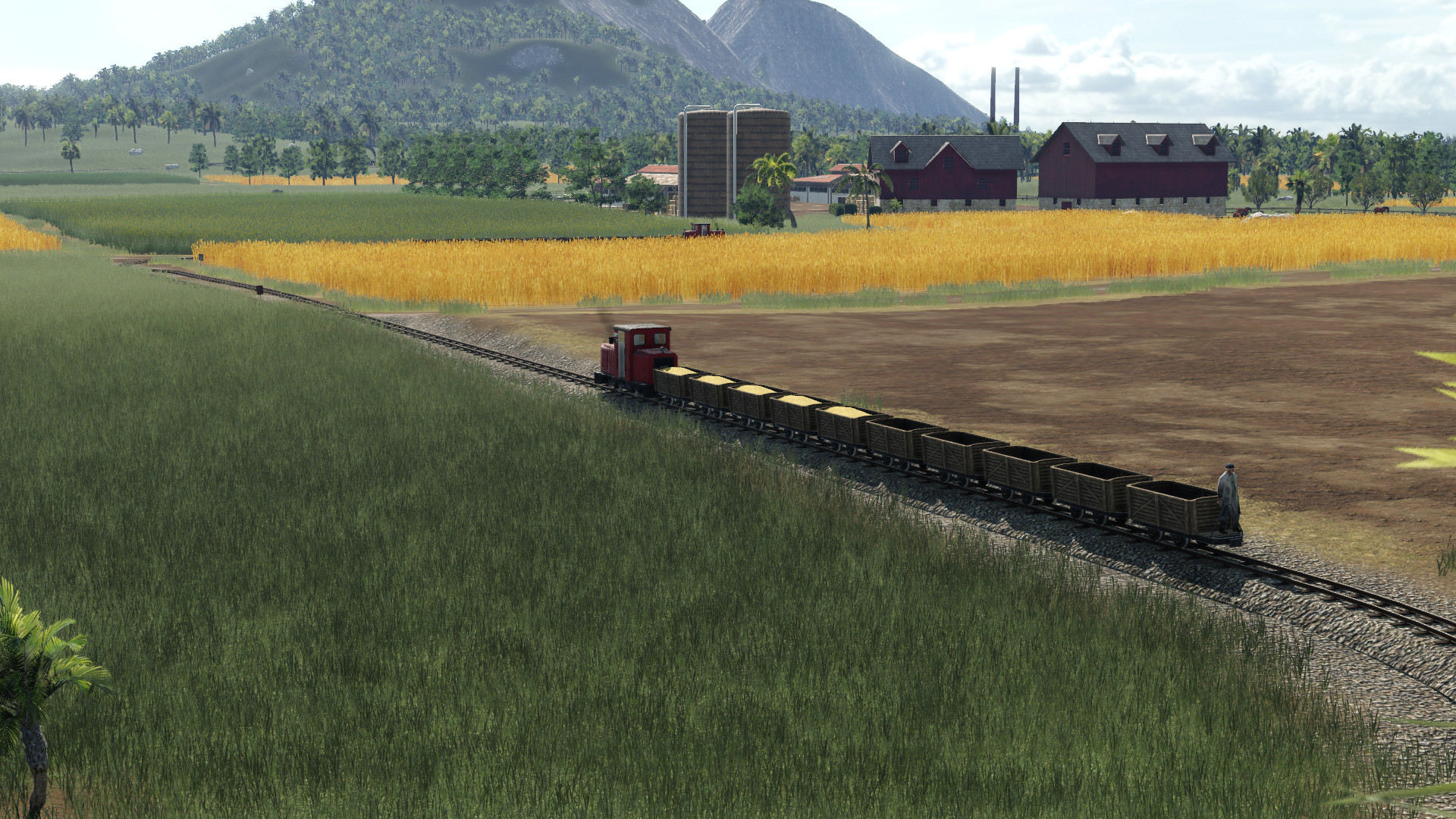 Feldbahn fährt auf Bauernhof und Industrieanlage "Lebensmittelfabrik"