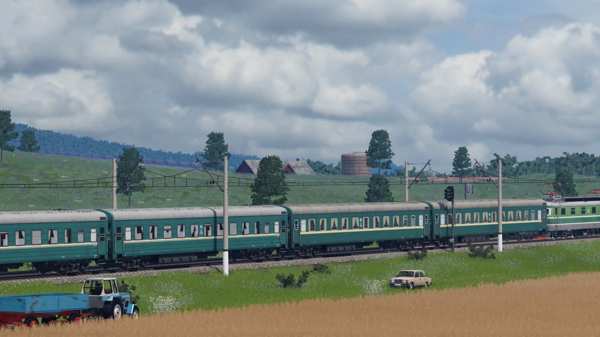 Overhauled Ammendorf Sleeping wagons in old green RZD livery near field