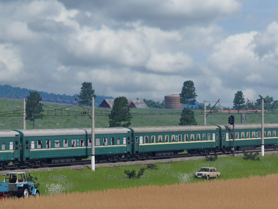 Overhauled Ammendorf Sleeping wagons in old green RZD livery near field