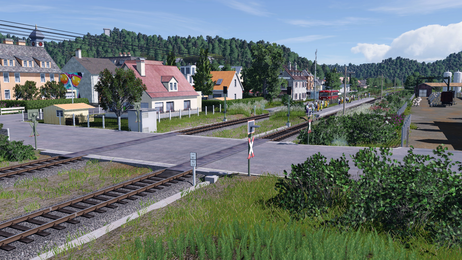Fahrgäste der Wanderbahn warten auf den Anschlusszug nach Zellau
