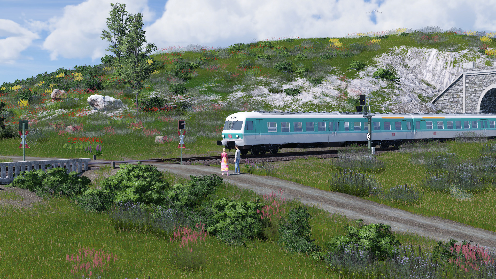 Die 614 314 bergab mit ende der durchfahrt des Lanzbergtunnels in alpiner Gegend