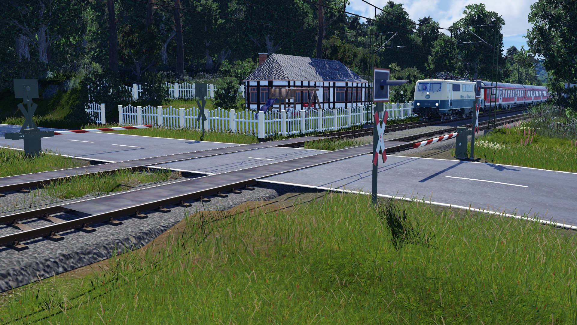 Bahnübergang mit Ersatzlokzug