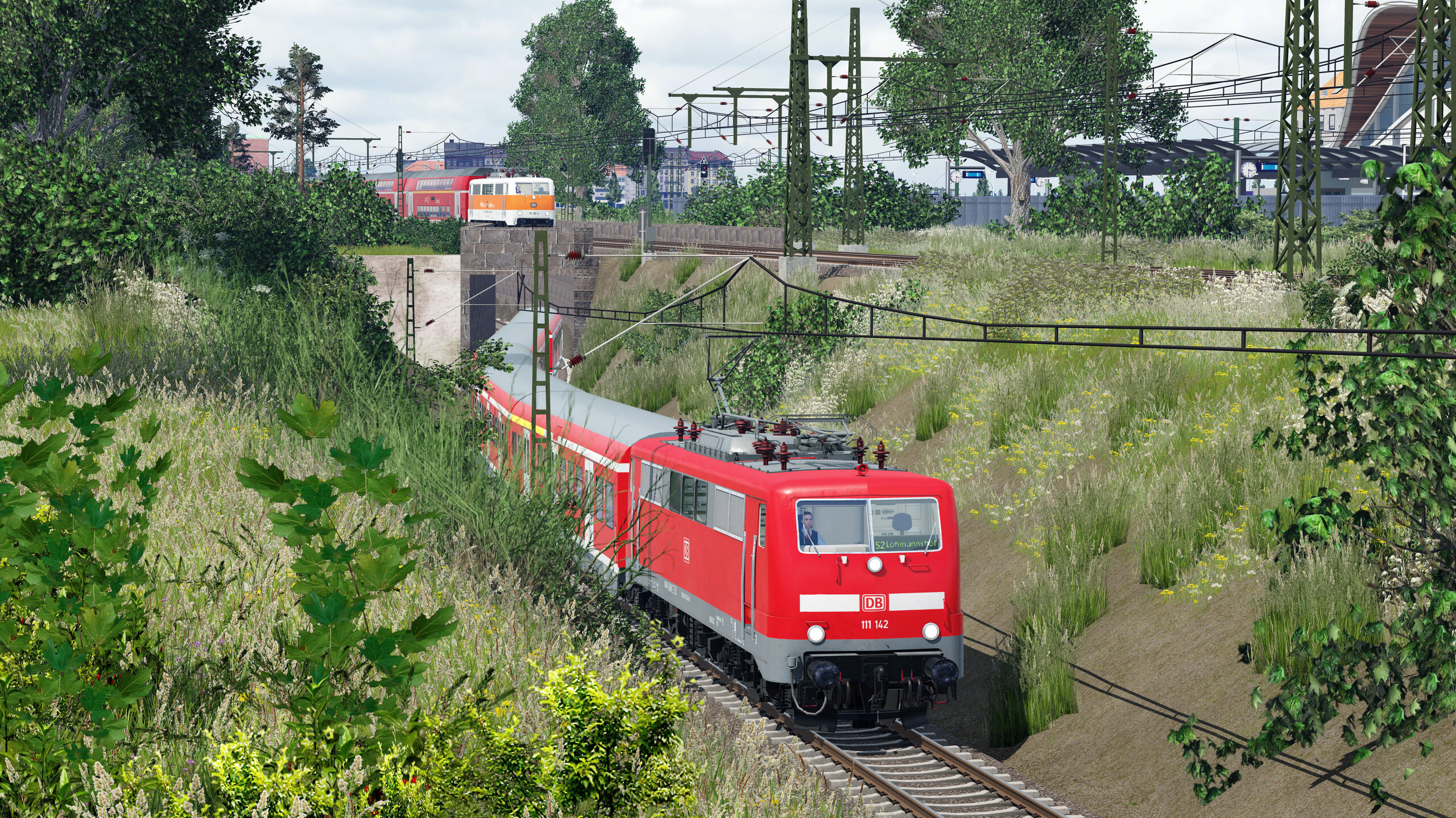 Zwei 111er nahe Dusseldorf, eine unterwegs als S-Bahn, die andere als RE.