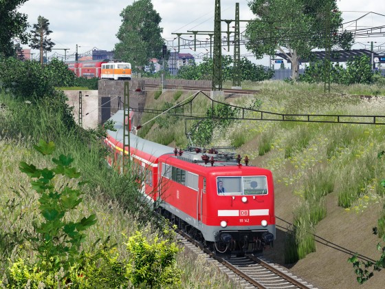 Zwei 111er nahe Dusseldorf, eine unterwegs als S-Bahn, die andere als RE.