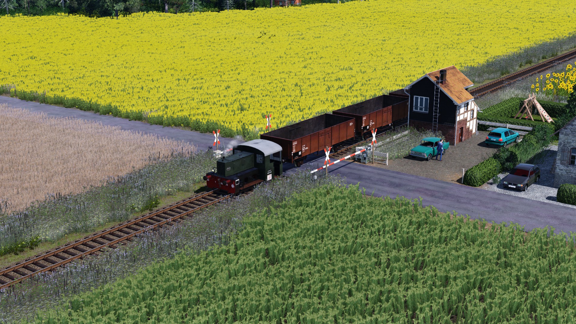 Köf mit Waggons von Steinbruch
