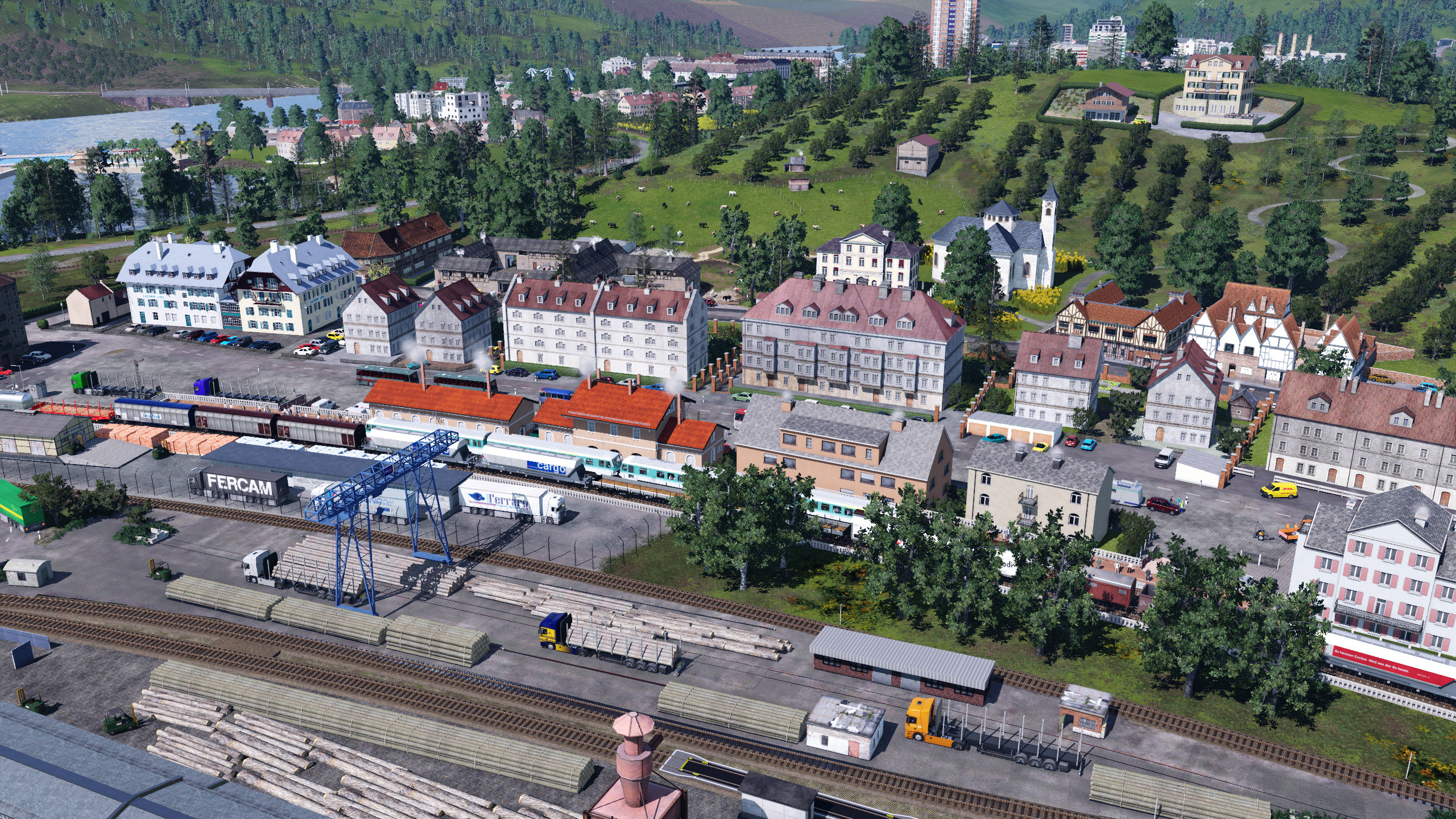 Blick auf die kleine Stadt am Bodensee mit dem kleinen Umschlagbahnof für Holz 1