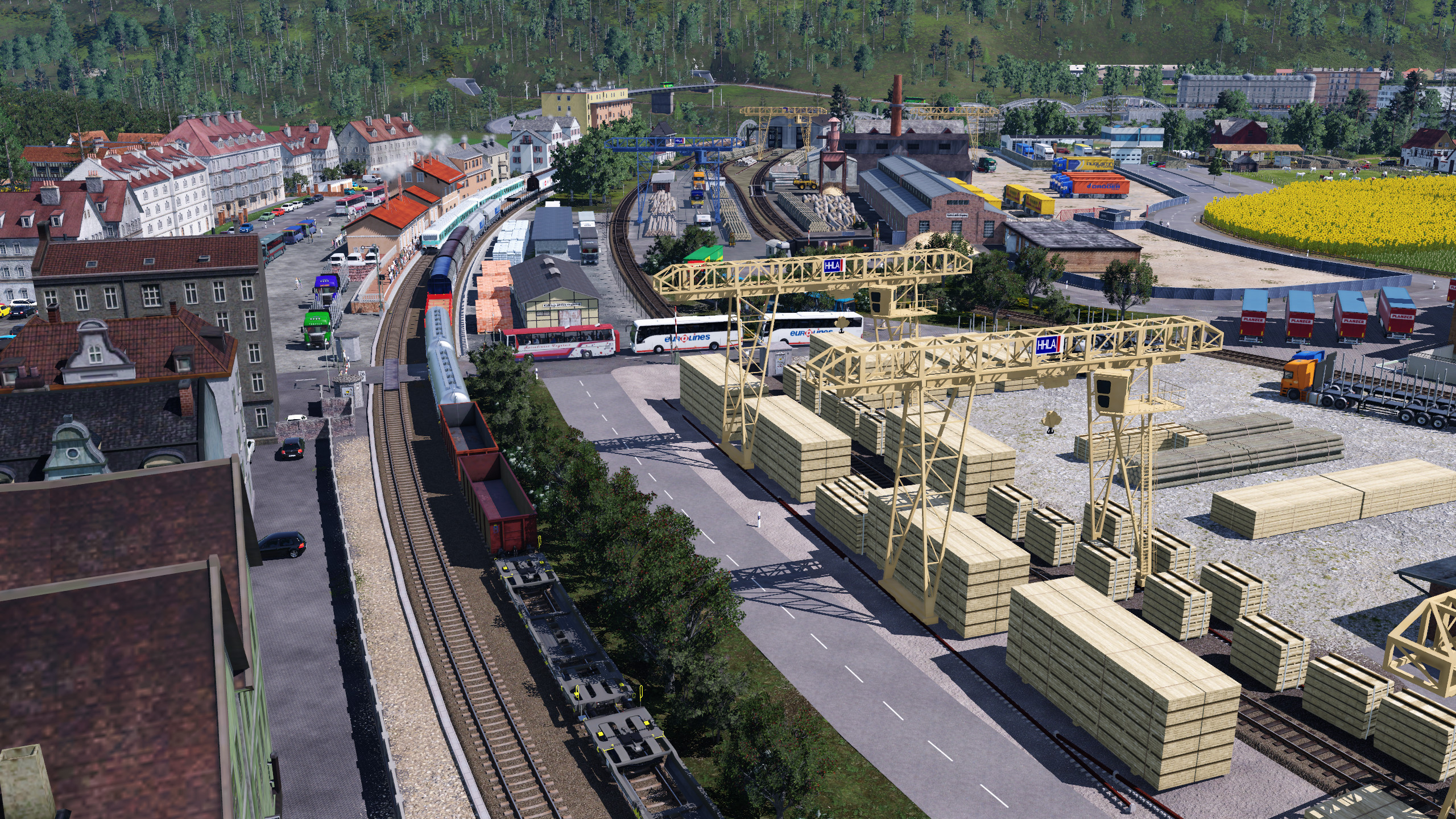 Blick auf die kleine Stadt am Bodensee mit dem kleinen Umschlagbahnof für Holz 2