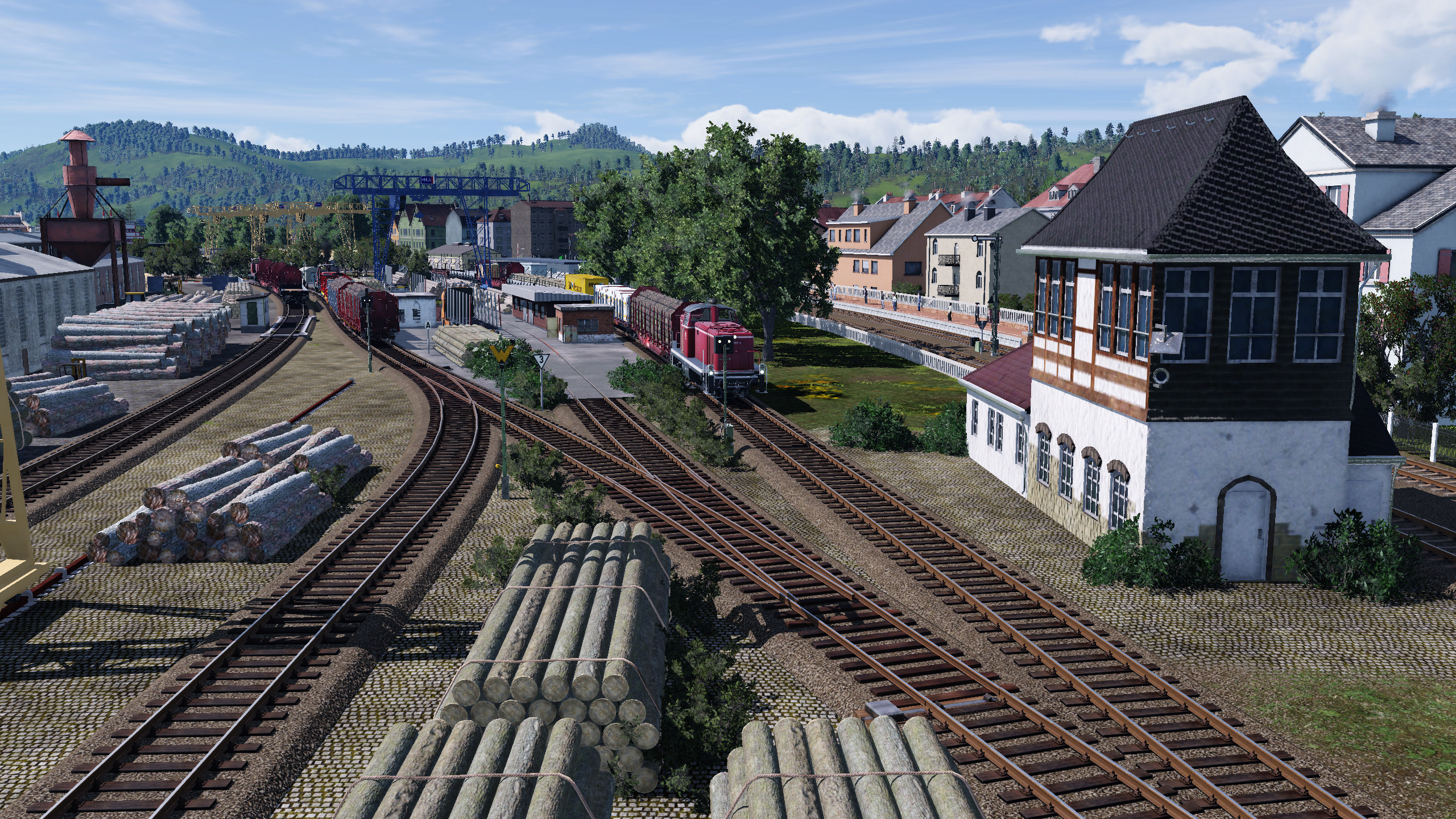 Blick auf die kleine Stadt am Bodensee mit dem kleinen Umschlagbahnof für Holz 4